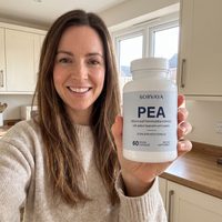 Sorvaya PEA Formula held by a customer in her kitchen